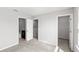 Bedroom with ensuite bath, walk-in closet and neutral color palette at 5006 Caspian St, St Cloud, FL 34771
