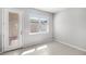 Bonus room with tiled floor, backyard view, and rear door at 5006 Caspian St, St Cloud, FL 34771