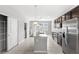 Modern eat-in kitchen with stainless steel appliances, granite countertops, and center island at 5006 Caspian St, St Cloud, FL 34771