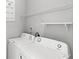 Laundry room with white front load washer and dryer at 5006 Caspian St, St Cloud, FL 34771