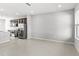 Spacious living room with tile flooring, recessed lighting, and open layout to kitchen at 5006 Caspian St, St Cloud, FL 34771