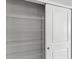 A well-organized pantry featuring wire shelving behind a sliding closet door at 5006 Caspian St, St Cloud, FL 34771