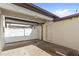 Enclosed brick patio with string lights, white privacy fence, and access door, ideal for outdoor gatherings at 5006 Caspian St, St Cloud, FL 34771