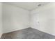 An additional bedroom with gray carpet, neutral walls, base trim, and a closet door at 5217 Marshelder St, Apopka, FL 32712
