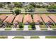 An aerial view of residences featuring well-kept front yards, driveways, and tile roofs at 5337 Watervista Dr, Orlando, FL 32821