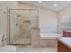 Bathroom featuring glass shower, soaking tub, tile flooring, and double vanity at 5337 Watervista Dr, Orlando, FL 32821