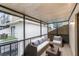Relaxing screened patio with outdoor seating and a view at 6095 Village Cir # 6095, Orlando, FL 32822