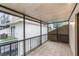 Relaxing screened patio with tile floor and an outdoor view at 6095 Village Cir # 6095, Orlando, FL 32822