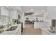 Open concept living and kitchen area featuring modern decor and plenty of natural light at 702 N Sweetwater Blvd, Longwood, FL 32779