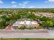 Aerial view of the community, showing the proximity to shopping and dining at Trader Joes at 7449 Sugar Bend Dr # 7449, Orlando, FL 32819
