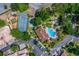 Overhead shot of the pool, tennis court, baseball field, and clubhouse in a picturesque community at 7449 Sugar Bend Dr # 7449, Orlando, FL 32819
