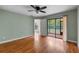 Bright and spacious bedroom leading out to a screened-in patio at 7449 Sugar Bend Dr # 7449, Orlando, FL 32819