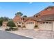 Charming townhome with terra cotta exterior, tile roof, and attached garages showcase neighborhood appeal at 7449 Sugar Bend Dr # 7449, Orlando, FL 32819