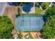 Aerial shot showcasing the tennis and basketball court with playground and park area nearby at 7449 Sugar Bend Dr # 7449, Orlando, FL 32819