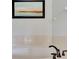 Relaxing bathtub with a classic faucet and neutral tile surround at 7519 Marker Ave, Kissimmee, FL 34747