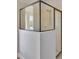 Modern glass-enclosed shower featuring sleek fixtures and white tiled walls at 7519 Marker Ave, Kissimmee, FL 34747