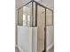 Modern bathroom featuring a glass-enclosed shower with white tile surround at 7643 Wilmington Loop, Kissimmee, FL 34747