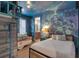 A whimsically themed bedroom with an iconic 'Ghostbusters' mural, unique bed, and playful decor at 7643 Wilmington Loop, Kissimmee, FL 34747