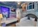 Themed bedroom with playful murals, custom bunk beds, and unique decorative design at 7643 Wilmington Loop, Kissimmee, FL 34747