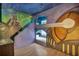 Imaginatively themed bedroom features bunk beds, custom murals, and unique decorative elements at 7643 Wilmington Loop, Kissimmee, FL 34747