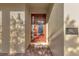 Charming front entry with a decorative door, address plaque, and well-maintained landscaping at 7643 Wilmington Loop, Kissimmee, FL 34747