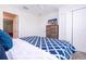 Bedroom with view of ensuite bathroom and built-in closet space at 780 Drop Shot Dr, Davenport, FL 33896