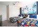 Nicely decorated bedroom features twin beds and a unique Star Wars-themed decor at 780 Drop Shot Dr, Davenport, FL 33896