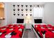 Bedroom featuring two twin beds with Mickey Mouse comforters and themed wall decorations at 780 Drop Shot Dr, Davenport, FL 33896