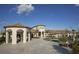 Beautifully landscaped exterior view showcasing the architecture and community features at 780 Drop Shot Dr, Davenport, FL 33896