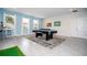 Entertaining game room with pool table and foosball table, great for recreation at 780 Drop Shot Dr, Davenport, FL 33896
