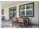 Outdoor patio seating area, perfect for entertaining guests and enjoying outdoor dining at 780 Drop Shot Dr, Davenport, FL 33896