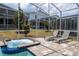 Backyard area with pool and spa, complete with lounge chairs for relaxation and outdoor enjoyment at 780 Drop Shot Dr, Davenport, FL 33896