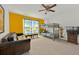 Bright bedroom featuring bunk beds, a comfortable couch, and playful Minion-themed decor at 786 Oxford Dr, Davenport, FL 33897