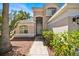 Inviting front entrance with a decorative door and manicured landscaping at 786 Oxford Dr, Davenport, FL 33897