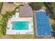 Aerial view showcasing community pool, clubhouse, and basketball court with lounge seating at 807 Ayden Oak Ln, Ocoee, FL 34761