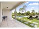 Stunning backyard with a luxurious pool, sun loungers, and a well-manicured lawn at 8105 Fenton St, Orlando, FL 32836