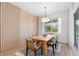 Dining area with modern table and chairs and a view of the outdoors at 8105 Fenton St, Orlando, FL 32836