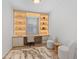 Bright office space featuring built-in shelving, a window, and comfortable seating and decor at 8105 Fenton St, Orlando, FL 32836