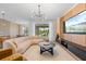 Living room with large sliding doors, modern lighting, and seamless indoor-outdoor living at 8105 Fenton St, Orlando, FL 32836
