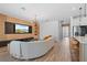 Spacious living room featuring modern decor, hardwood floors, and plenty of natural light at 8105 Fenton St, Orlando, FL 32836