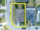 Aerial view of home showcasing the roof, driveway, and landscaping within property lines at 822 Sheen Cir, Haines City, FL 33844