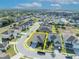 Aerial view of home showcasing the roof, driveway, and landscaping within property lines in a suburban neighborhood at 822 Sheen Cir, Haines City, FL 33844
