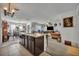 Bright, open-concept kitchen flowing into living and dining areas, perfect for entertaining at 822 Sheen Cir, Haines City, FL 33844