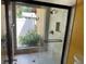 Modern bathroom featuring a glass shower with tile surround and a view to the home's exterior at 872 Huckleberry Ln, Winter Springs, FL 32708
