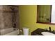 Bathroom features granite countertop, decorative tiling in the shower, and modern fixtures at 872 Huckleberry Ln, Winter Springs, FL 32708