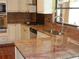 Kitchen with stainless steel appliances, granite countertops and custom cabinets at 872 Huckleberry Ln, Winter Springs, FL 32708