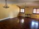 Spacious living room featuring wood floors, natural light and decorative lighting at 872 Huckleberry Ln, Winter Springs, FL 32708