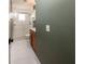 Bathroom featuring tiled floors, a vanity with a wooden cabinet, and a shower with glass doors at 10108 Matchlock Dr, Orlando, FL 32821