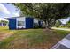 Single-story home with manicured lawn and mature tree providing ample shade at 10108 Matchlock Dr, Orlando, FL 32821