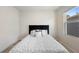 Minimalist bedroom offers natural light and neutral tones creating a calming atmosphere at 1105 Grand Hammock Ct, Kissimmee, FL 34746